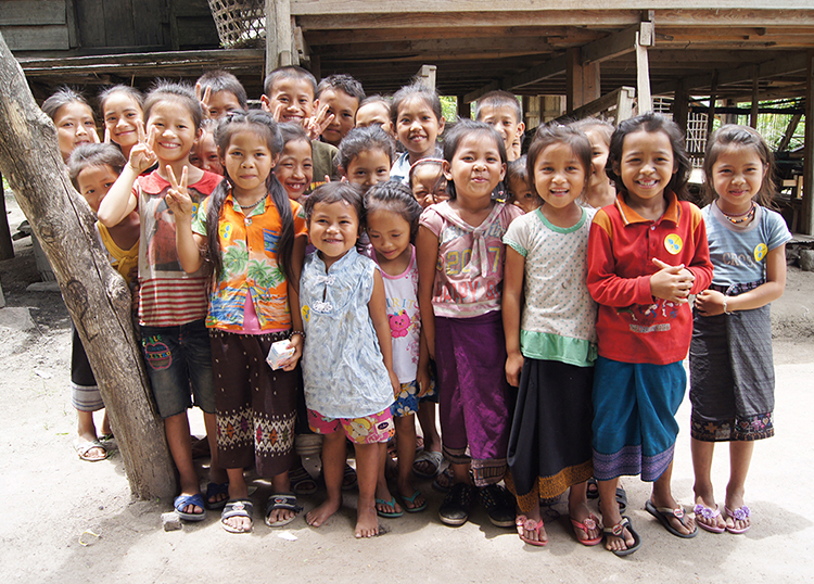 Children welcoming us in the village in Laos
